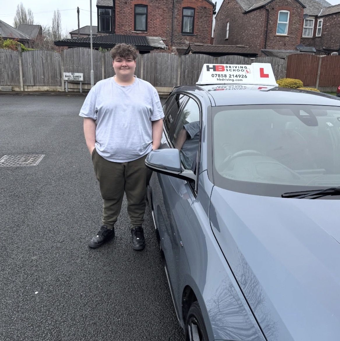 HB Driving School learner celebrating passing his driving test